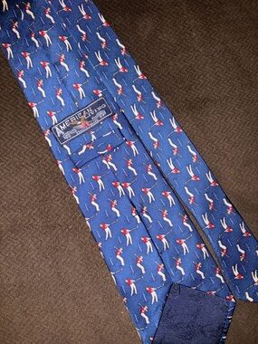 Blue Silk Tie with Red and White Golfer Motif